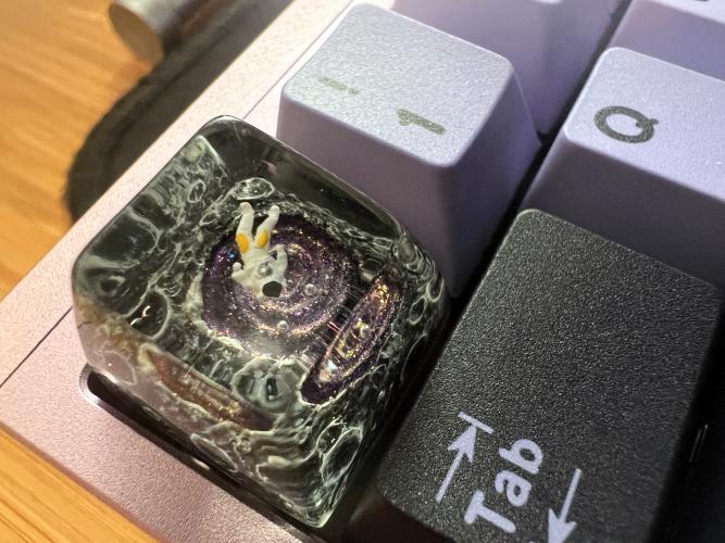 Closeup of artisan space man keycap